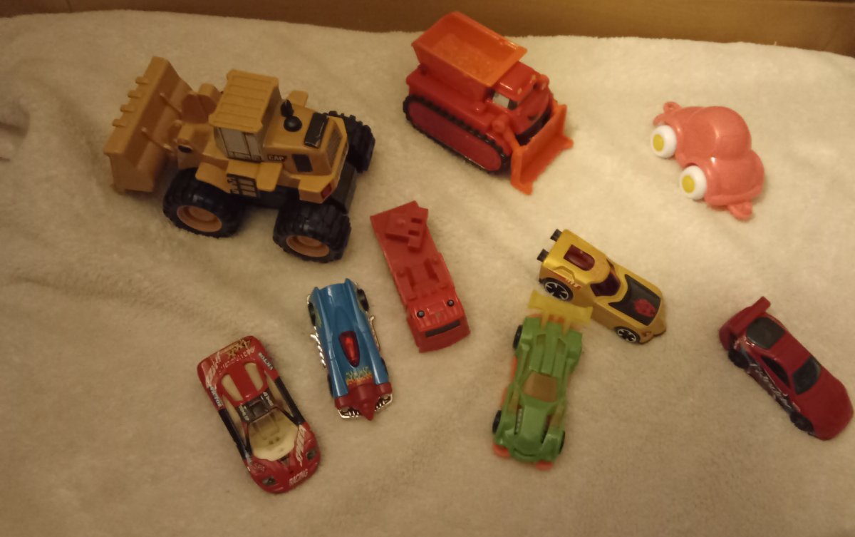 Illustration de Jouet dinosaures / voitures