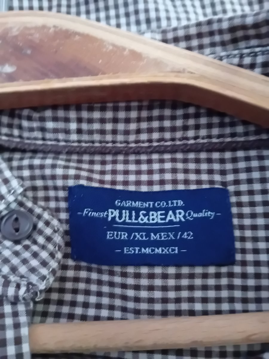 Illustration de Chemise homme pull bear XL / Eur 42