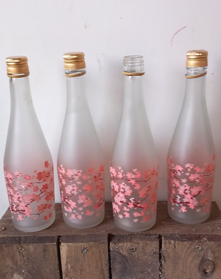 Image quatre petites bouteilles romantiques