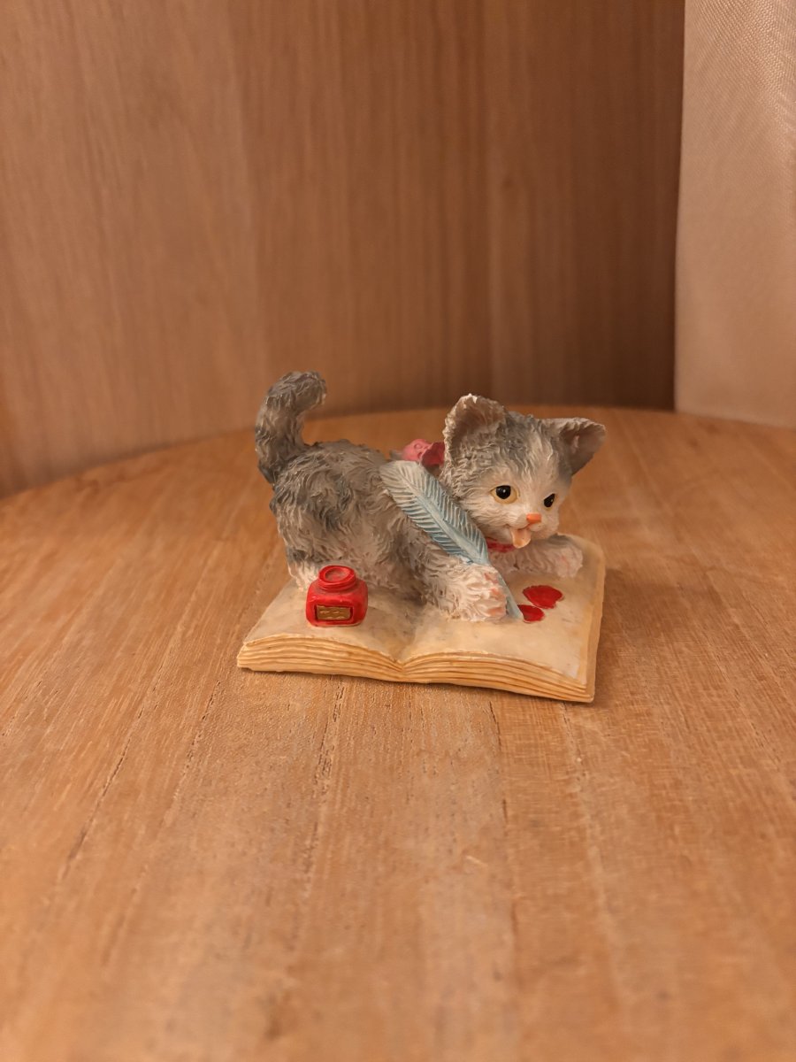 Image Statuette chat qui dessine