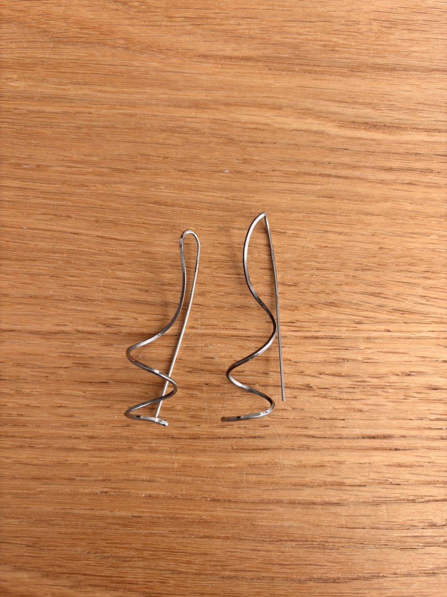 Illustration de Boucles d’oreilles argentées