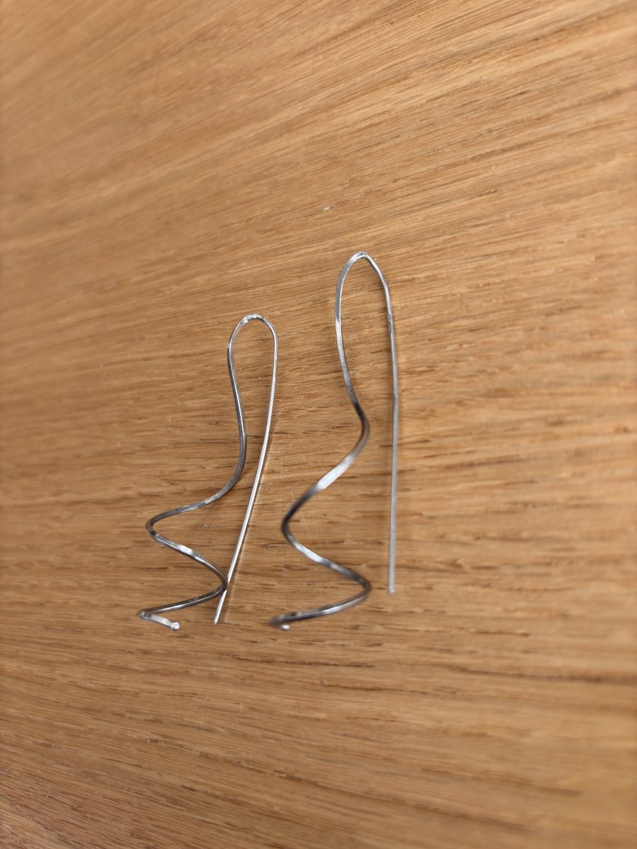 Illustration de Boucles d’oreilles argentées