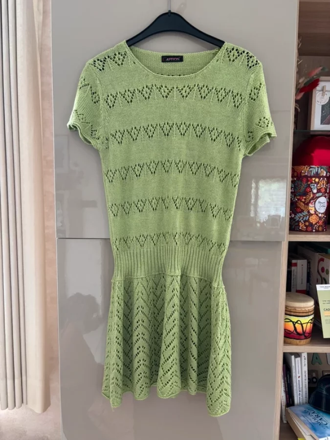 Illustration de Robe verte vintage style crochet