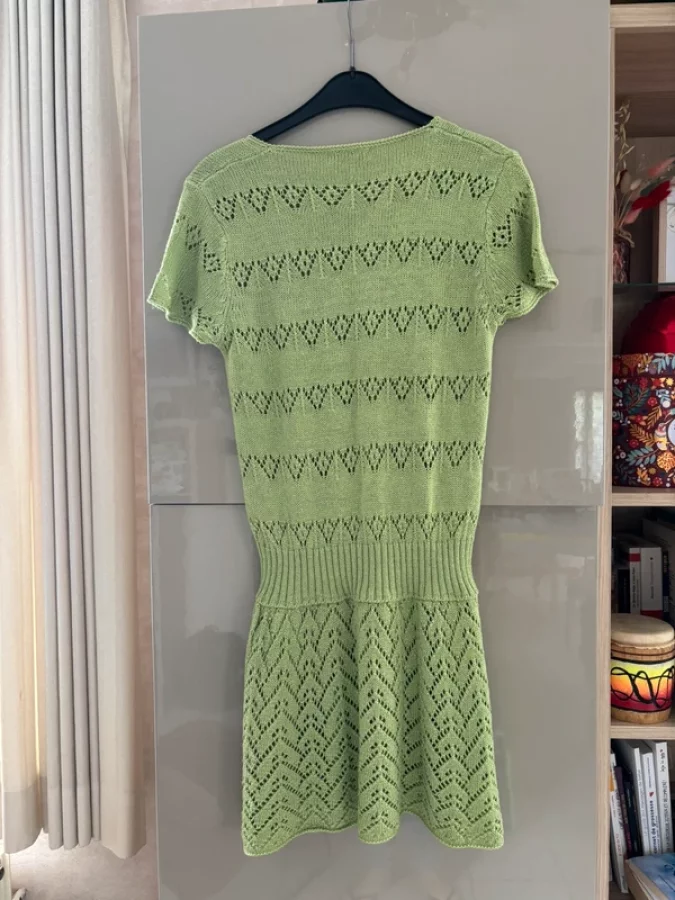 Illustration de Robe verte vintage style crochet